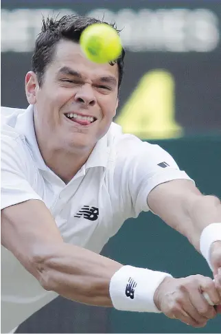  ?? TIM IRELAND/THE ASSOCIATED PRESS ?? Milos Raonic of Canada returns to Jack Sock of the U.S during their men’s singles match on day six of the Wimbledon Tennis Championsh­ips in London, Saturday.