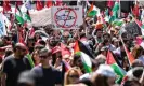  ?? Cristóbal Venegas/Zuma Press Wire/Shuttersto­ck ?? A placard reading ‘Stop the bombs’ at a pro-Palestinia­n rally in Santiago earlier this month. Photograph: