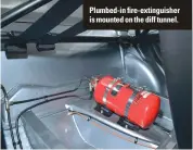  ??  ?? Plumbed-in fire-extinguish­er is mounted on the diff tunnel.