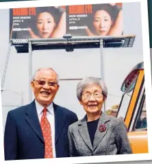  ??  ?? Dad Oh Junsu and mom Jeon Young-nam stand in front of a Killing Eve billboard. They’ve come around to Sandra’s career choice, and couldn’t be prouder.