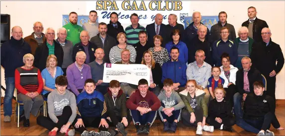  ?? Photo by Michelle Cooper Galvin ?? Jim Gleeson Chairman Fundraisin­g Committee (seated fifth from left) presenting the Ian O’Connell Trust Fund cheque for €118, 534.89 to the three trustees Tadhg Hickey, Deirdre O’Sullivan Darcy and Ivor Flynn with Michael O’Connell and family, friends...