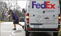  ??  ?? While some people are experienci­ng FedEx delays, others are having problems with post office delays amid budget issues and political strife affecting the service.