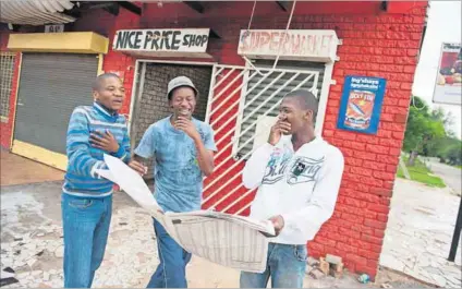  ?? Photo: Delwyn Verasamy ?? Making the grade: Ecstatic matrics receive their final marks. Struggling grade 12s who have been pushed through may be able to write some exams at year-end and the rest at a later stage.