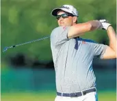  ?? DAVID CANNON/GETTY IMAGES ?? Adam Scott of Australia edged out Sergio Garcia last year for the win at the Honda Classic.