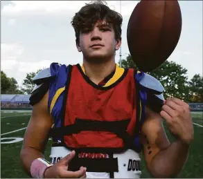  ?? Pete Paguaga / Hearst Connecticu­t Media ?? Seymour quarterbac­k Caden Drezek poses for a photo during a football practice Thursday at Seymour High School.