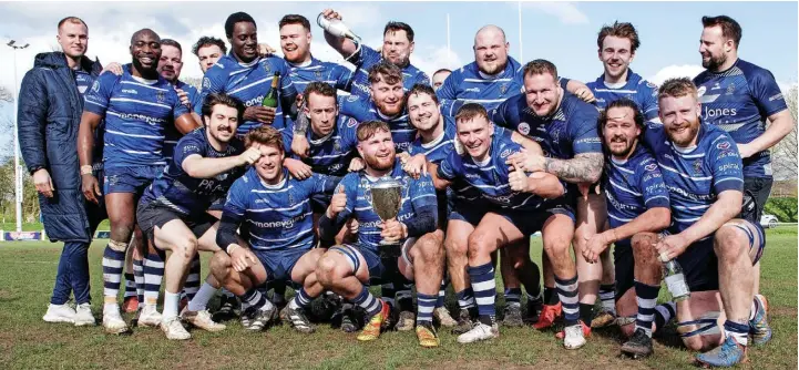  ?? Rob. Hockney ?? ●●Macclesfie­ld RUFC’s 1st XV celebrate their well-earned promotion into the National Leagues following Saturday’s victory against Aldwinians. See pages 44 & 45