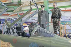  ?? AFP ?? President Hassan Rouhani at the cockpit of Kowsar fighter jet.