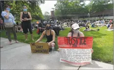  ?? Matthew Brown / Hearst Connecticu­t Media ?? Protesters in front of Greenwich Town Haill on Saturday in Greenwich rally for police reform and hold a moment of silence in the wake of the senseless death of George Floyd.