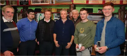  ?? Photo by Declan Malone ?? Player of the Year Tom Seán O’Sullivan and Young Player of the Year Mikey Boyle (right) with, from left, Dingle GAA sponsors Fergus O’Flaherty and Michael Begley, West Kerry GAA PRO Breandán Fitzgerald, Seán Geaney and Paul Geaney at the Dingle GAA awards night in O’Flaherty’s bar on Friday night.