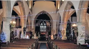  ??  ?? Trees in Holy Trinity Church. Picture by Peter Fryer.