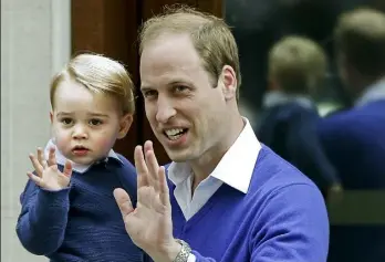  ?? Alastair Grant/Associated Press ?? Britain's Prince William and his son Prince George wave Saturday as they return to the exclusive Lindo Wing at St. Mary's Hospital in London. The newborn baby princess takes a nap Saturday while being carried in a car seat by her father.