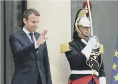  ??  ?? 0 Emmanuel Macron bids farewell to his Madagascan counterpar­t