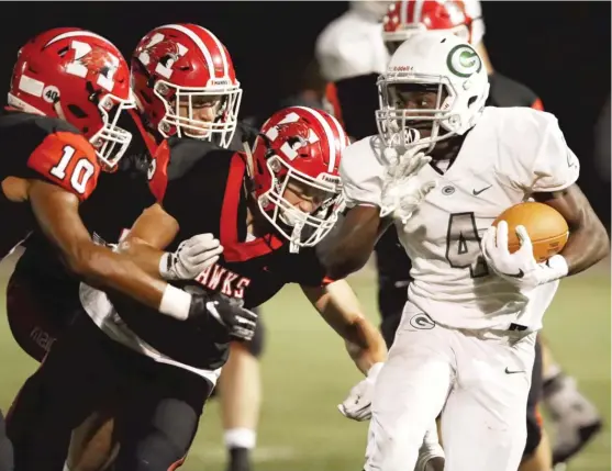  ?? KEVIN TANAKA/FOR THE SUN-TIMES ?? Glenbard West speedster Tyquan Cox, shown here in Week 1 against Maine South, had five TDs, including a 96-yard kickoff return, against Lyons on Saturday.