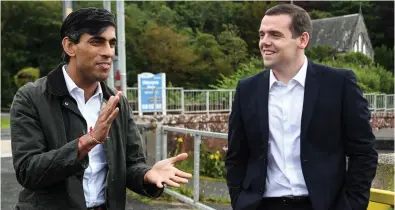  ??  ?? Meeting: Chancellor Rishi Sunak with Scottish Conservati­ve leader Douglas Ross in August
