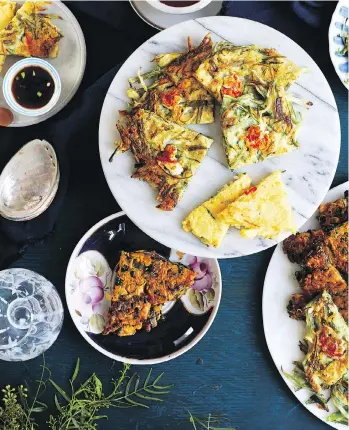  ?? PHOTOS: LEELA CYD/COUNTRYMAN PRESS ?? Green onion and seafood pancakes make a quick and delicious snack or appetizer, says Kim Sunée, co-author of Everyday Korean: Fresh, Modern Recipes for Home Cooks.