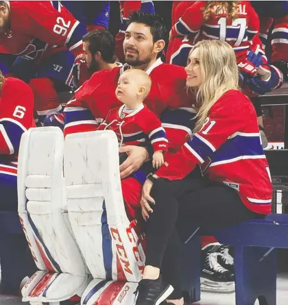 ?? MONTREAL CANADIENS ?? Carey Price with wife Angela and daughter Liv Anniston during Canadiens photo day at the Bell Centre in Montreal on March 27, 2017. The Prices are spending their time during the COVID-19 pandemic in the Tri-cities area of Washington state, where Angela Price is from.
