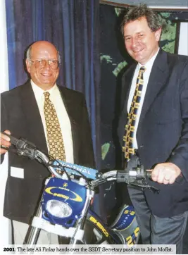  ??  ?? 2001: The late Ali Finlay hands over the SSDT Secretary position to John Moffat.