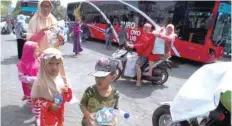  ?? — Reuters ?? Residents bring plastic bottles to exchange for Suroboyo bus tickets at Purbaya station, Indonesia.