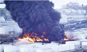  ?? Photo: AP ?? Firefighte­rs battle a petrochemi­cal blaze at the Interconti­nental Terminals Company Texas, United State yesterday. The fire was likely to burn for another two days, authoritie­s said.