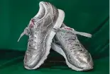  ??  ?? FAVORITE SHOES: Silver Reebok sneakers