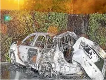  ?? SUPPLIED/NZ POLICE ?? The charred remains of the fleeing car, which exploded after crashing in Christchur­ch, killing the three teenage boys inside. The car crashed into a tree after hitting road spikes placed by police after a pursuit was abandoned.