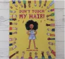 ??  ?? DON’T Touch My Hair! by Sharee Miller is “a beautiful book that can be used passive-aggressive­ly with family.” | @Naptural85/Facebook