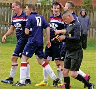  ?? Match report and photos: Derek Black ?? Craig MacEwan is congratula­ted by Kerr Newbigging, Myles McAuley and Paul Carmichael on netting his hat-trick.