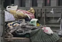  ?? AP photo ?? An ethnic Armenian woman from Nagorno-Karabakh rests in a truck as she arrives in Goris, Syunik region, Armenia, on Wednesday.