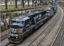  ?? AP 2017 ?? Norfolk Southern has deep ties to Atlanta, tracing its roots to a predecesso­r here, and the company has more jobs in Georgia than in its home state of Virginia. The company recently expanded its Midtown operations center.