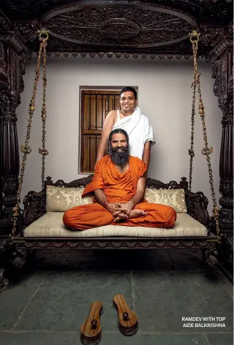  ??  ?? RAMDEV WITH TOP AIDE BALKRISHNA