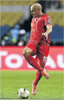  ?? / AFP ?? England striker Harry Kane, left, will face Tunisia midfielder Wahbi Khazri in tonight’s opener.