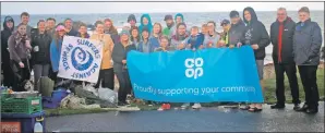  ??  ?? The volunteers who helped at the beach clean.