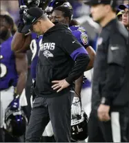  ?? NICK WASS - THE ASSOCIATED PRESS ?? Baltimore Ravens head coach John Harbaugh reacts after a Ravens fumble recovered by the Tennessee Titanson during the second half of an NFL divisional playoff football game against the Tennessee Titans, Saturday, Jan. 11, 2020, in Baltimore.