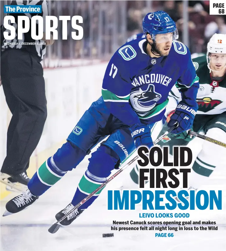  ?? — THE CANADIAN PRESS ?? The Vancouver Canucks’ Josh Leivo skates with the puck while being watched by the Minnesota Wild’s Eric Staal during Tuesday’s game at Rogers Arena.