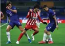  ??  ?? João Félix finds his path blocked on a frustratin­g night for him at Stamford Bridge. Photograph: Matthew Lewis/Uefa/ Getty Images