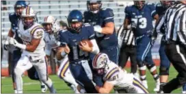  ?? DIGITAL FIRST MEDIA FILE ?? Villanova quarterbac­k Zack Bednarczyk, center in this file photo, was injured early in Saturday night’s game against Towson.