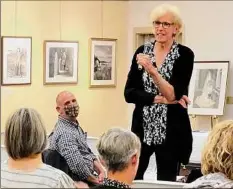  ?? Photo by Susanne Murtha ?? Author Connelly Akstens reads at the Cranston Library.