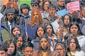  ?? AP PHOTO/GEORGE WALKER IV ?? On March 19, people gather for a news conference of the Tennessee Immigrant and Refugee Rights Coalition outside the state Capitol in Nashville.