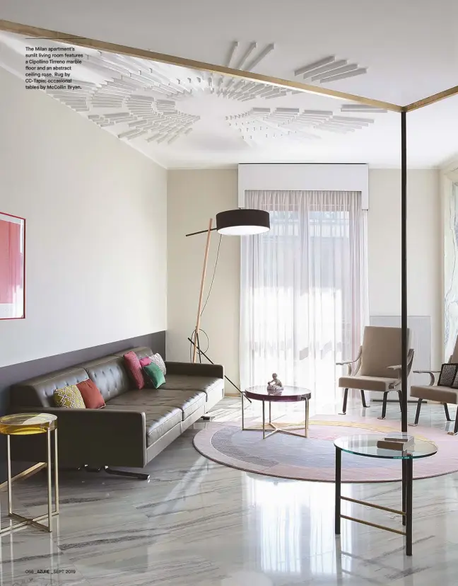  ??  ?? The Milan apartment’s sunlit living room features a Cipollino Tirreno marble floor and an abstract ceiling rose. Rug by Cc-tapis; occasional tables by Mccollin Bryan.