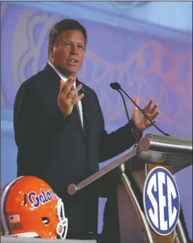  ?? The Associated Press ?? FACING HIGH TIDE: Coach Jim McElwain’s Florida Gators enter the 2017 football season with back-to-back Southeaste­rn Conference Eastern Division titles followed by double-digit losses to Alabama in the league championsh­ip game.