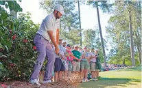  ?? GEORGE WALKER IV/THE ASSOCIATED PRESS ?? Scottie Scheffler hits from the pine straw on the 10th hole Saturday at the Masters in Augusta, Ga.