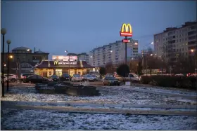  ?? FILE — THE ASSOCIATED PRESS ?? McDonald’s restaurant is seen Dec. 6, 2014in the center of Dmitrov, a Russian town 47 miles north of Moscow, Russia.