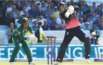  ?? AFP ?? England batsman Joe Root plays a backfoot drive during the first One Day Internatio­nal against South Africa at Headingley in Leeds yesterday. The hosts finished their innings at 339 for six in 50 overs with captain Eoin Morgan scoring a century.