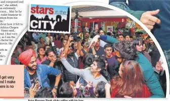  ??  ?? Actor Ranveer Singh clicks selfies with his fans