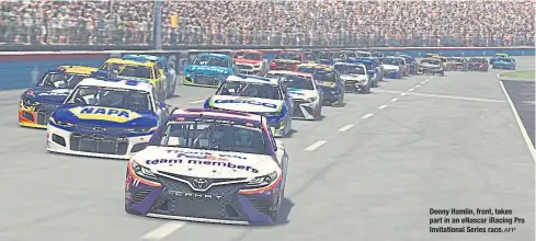  ?? AFP ?? Denny Hamlin, front, takes part in an eNascar iRacing Pro Invitation­al Series race.