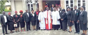  ?? ?? Rt. Rev. Victor Ebipade Okporu ( ninth left); Ven. Prof. Onyinye Okpala ( sixth right); Ven. Emma Nwaogazi ( eighth left) and President, Knights of Western Izon, Sir Monday Ayoro ( seventh left) with other knights after the Holy Communion Service at Ibru Centre Agbarha- otor, Delta State