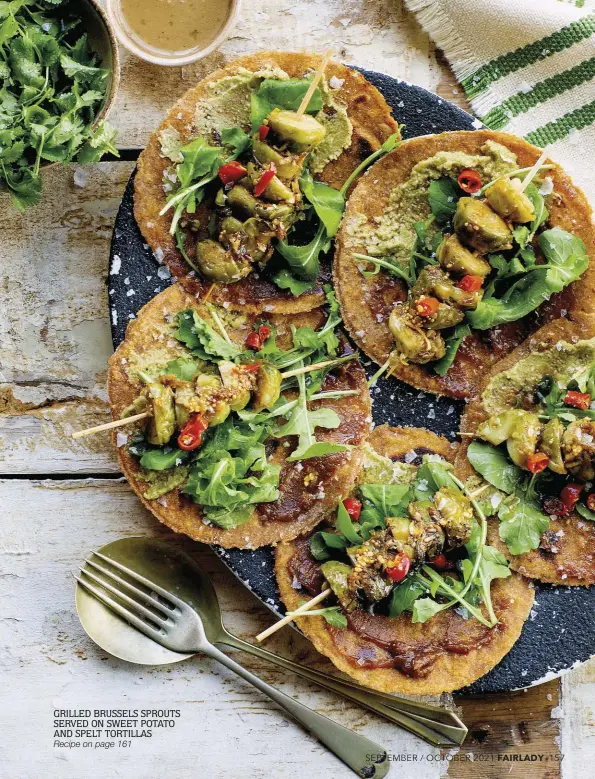  ?? ?? GRILLED BRUSSELS SPROUTS SERVED ON SWEET POTATO AND SPELT TORTILLAS Recipe on page 161