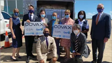  ??  ?? Reaching out: Ambassador Craig Cloud joined Botswana government officials and Heads of Foreign Missions to welcome the arrival of the COVAX vaccine on Saturday at the Sir Seretse Khama Internatio­nal Airport