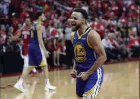  ?? ERIC GAY - THE ASSOCIATED PRESS ?? Golden State Warriors guard Stephen Curry (30) celebrates the team’s win over the Houston Rockets in Game 6 of a second-round NBA basketball playoff series, Friday, May 10, 2019, in Houston. Golden State won 118-113, winning the series.