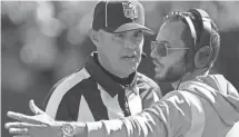  ?? ROBERT DEUTSCH/USA TODAY SPORTS ?? Dolphins head coach Mike McDaniel talks with an official after a play against the New York Jets on Oct. 9.